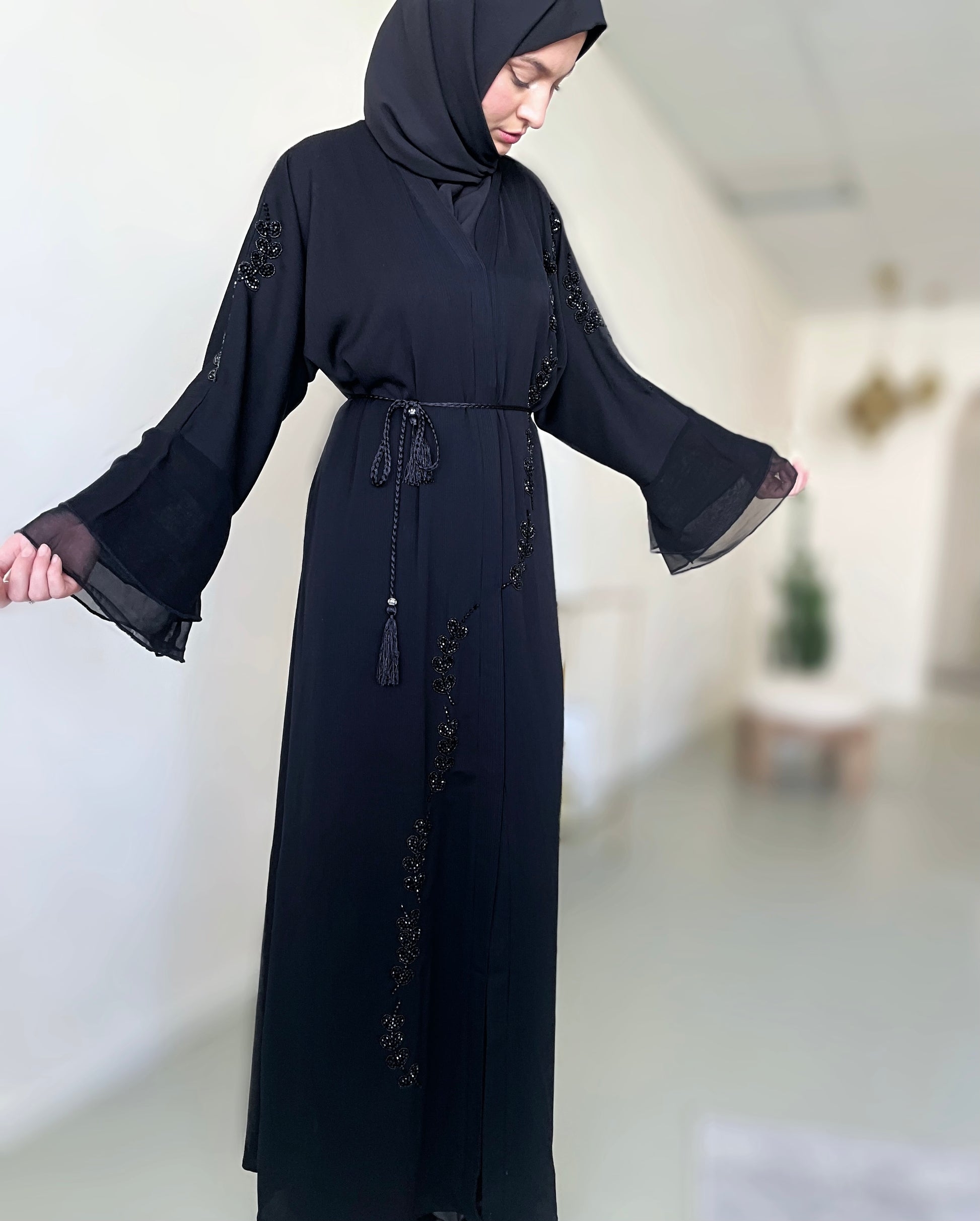 Inayah clearance abaya sale